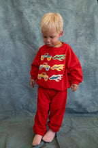 Red toddler joggers with slightly dropped crotch and stretchy cotton