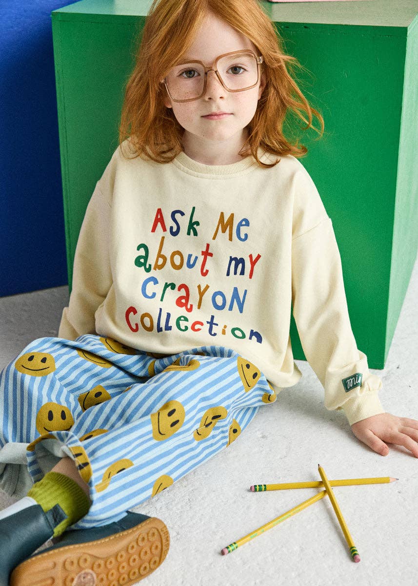 Kids graphic sweatshirt reading Ask Me About My Crayon Collection, oversized fit