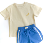 Large BANANAS print across the back of the oversized toddler tee