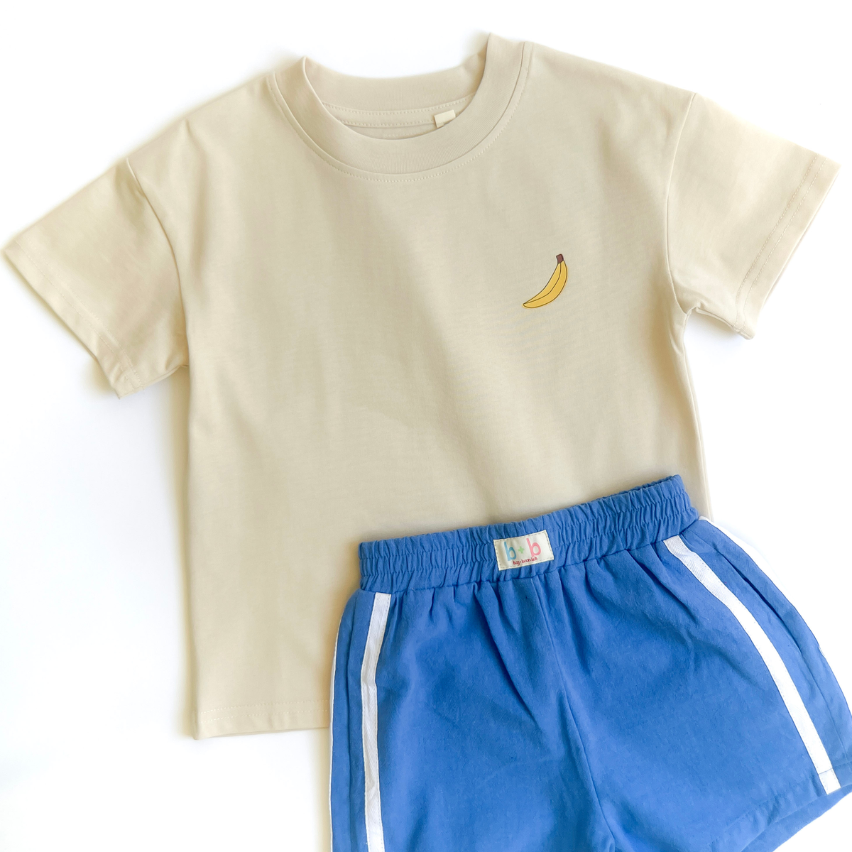 Large BANANAS print across the back of the oversized toddler tee