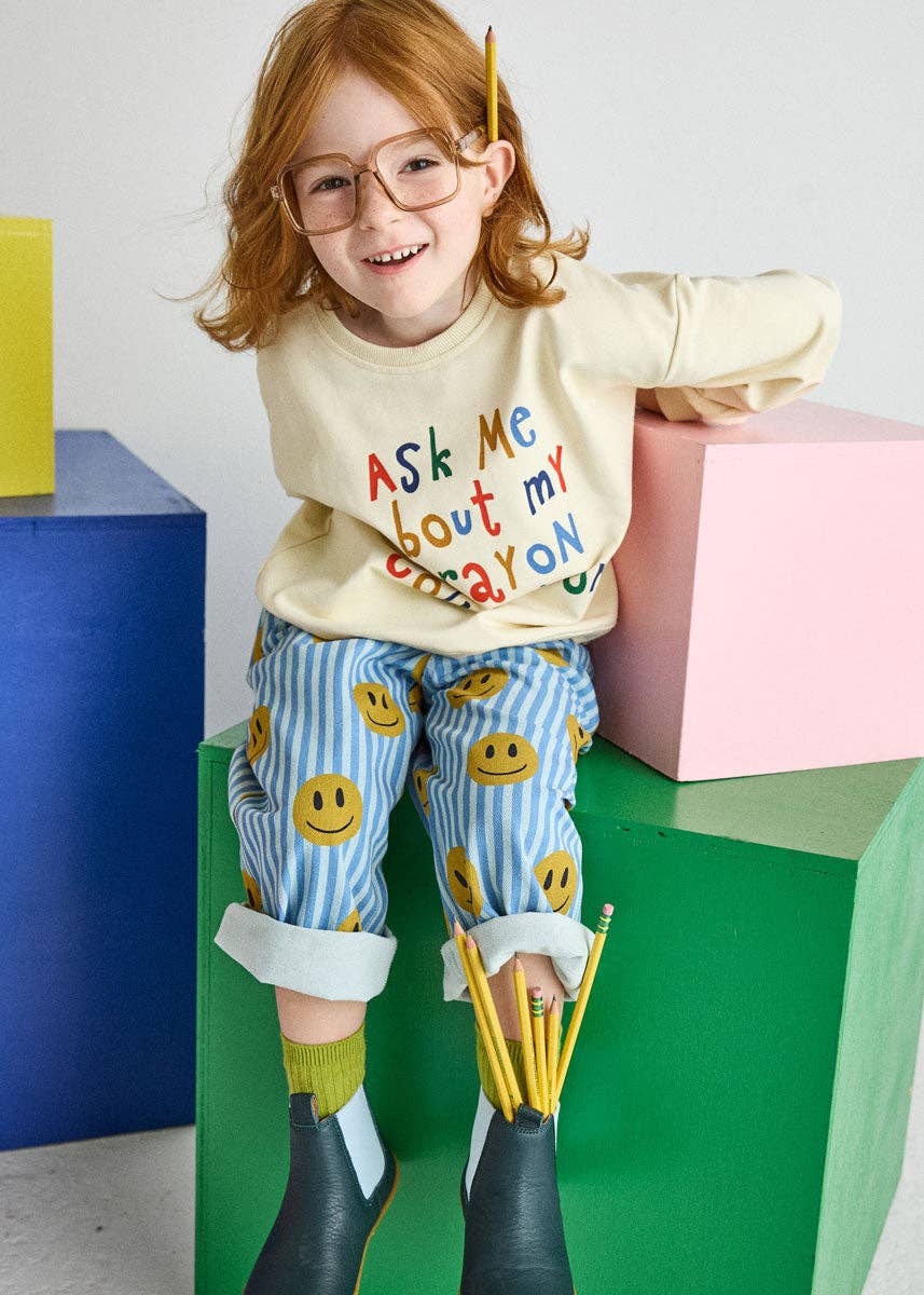 Toddler crayon sweatshirt with colorful logo detail on the sleeve
