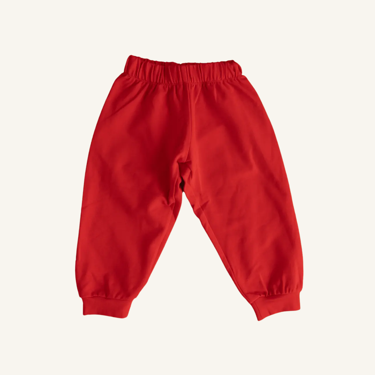 Cherry Easy Joggers, bold red relaxed-fit kids joggers with elastic ankle cuffs