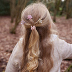 Four glitter star hair claw clips for kids