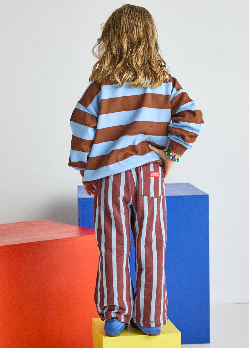 Striped kids sweatshirt paired with the burgundy and blue striped pants