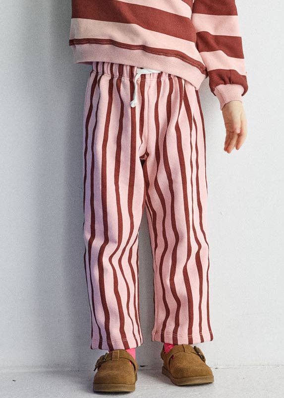 Unisex striped toddler pants in pink and burgundy cotton with adjustable cuffs