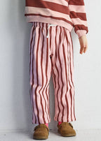 Unisex striped toddler pants in pink and burgundy cotton with adjustable cuffs